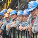trabajores de la INC- hombres- obreros