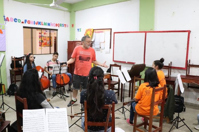 Sonidos de la tierra, escuelas comunitarias de música, rifa,